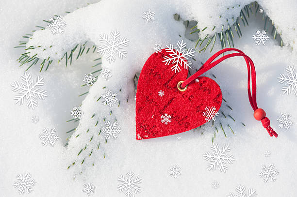 istock heart toy on snow background 461785055