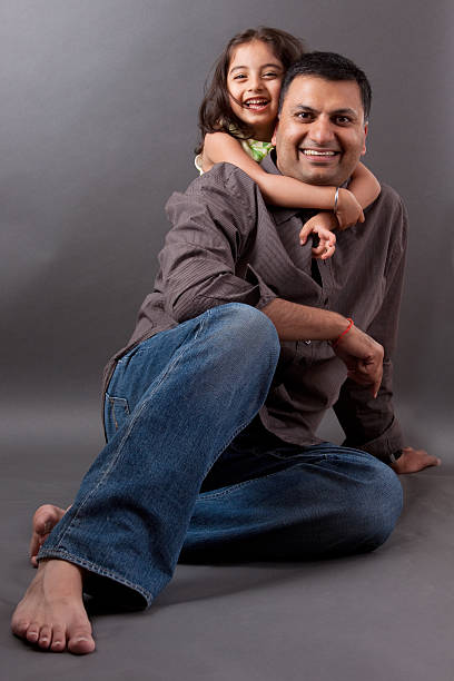 istock Happy East Indian man with his daughter 461789839