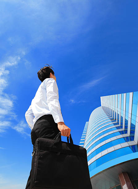 istock successful business man outdoors Next to Office Building 461790483