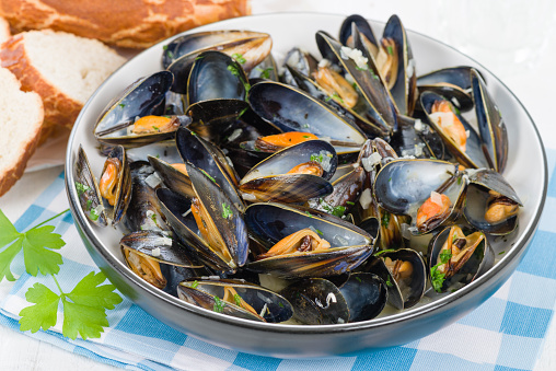 Moules Marinieres - Mussels cooked with white wine sauce.