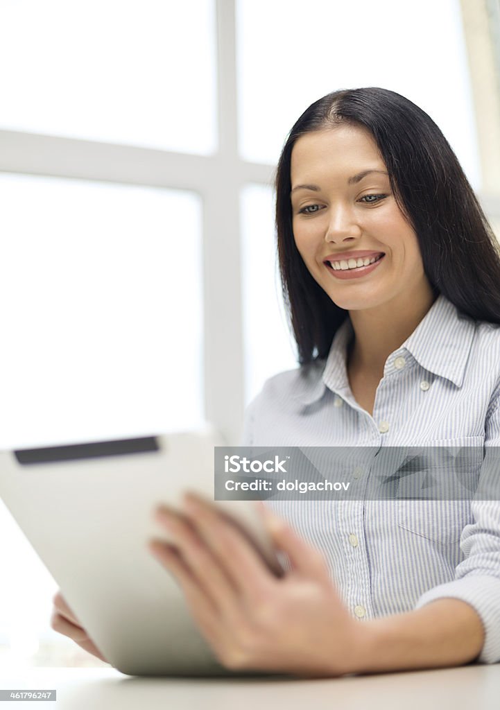 smiling woman or student with tablet pc computer business, education, technology, people and internet concept - smiling woman or student with tablet pc computer  Adult Stock Photo