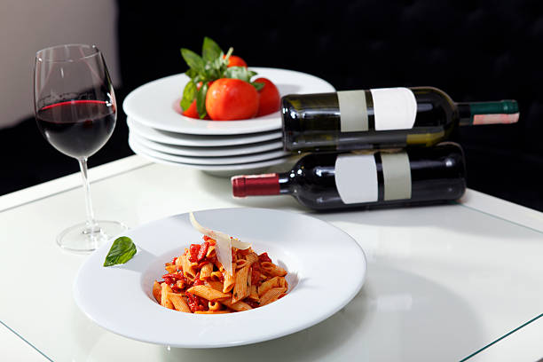istock Pasta with tomato sauce and wine 461806283
