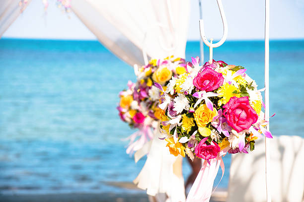 istock flowers decorations during outdoor wedding ceremony seaside 461808517