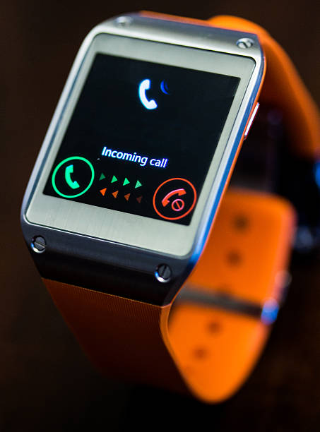 istock Orange smart watch receiving a call 461808639