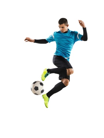 Professional football player is saves a ball on white background