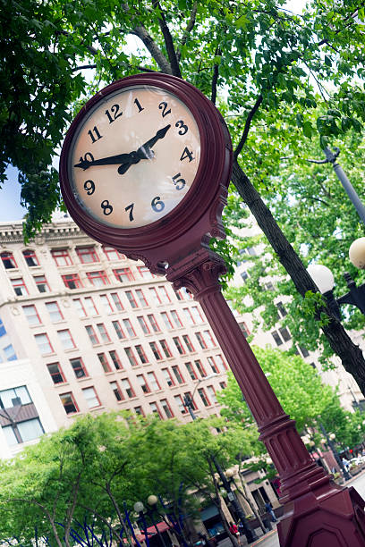 istock Large Victorian Style Clock Mounted Lamp Post Timepiece City Downtown 461809241