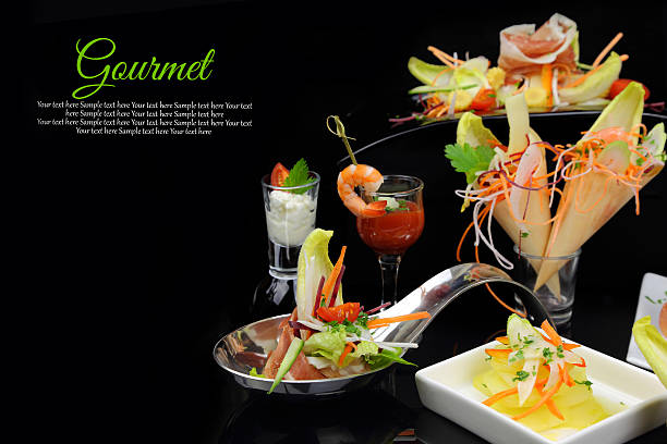 istock Various gourmet dishes with copy-space on black background 461810297