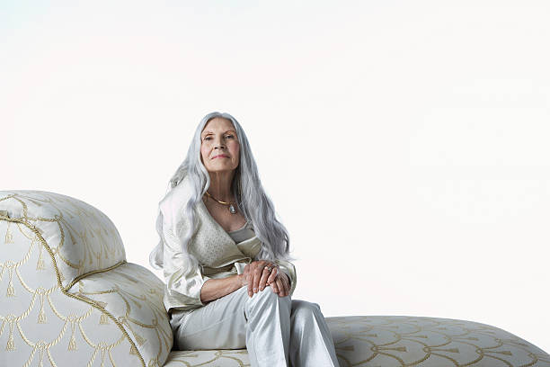istock Senior Woman On Chaise Lounge 461820065