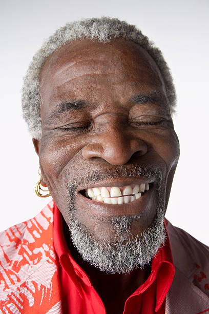 istock Smiling Senior Man With Eyes Closed 461820495