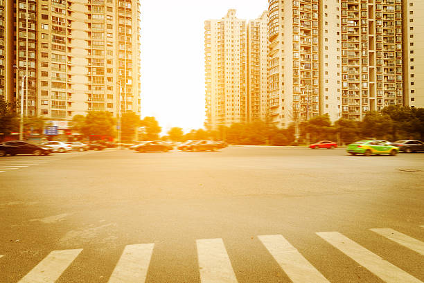 istock road in city with sunset 461854383