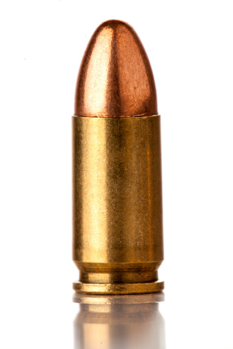 9mm bullet for a gun isolated on a white background