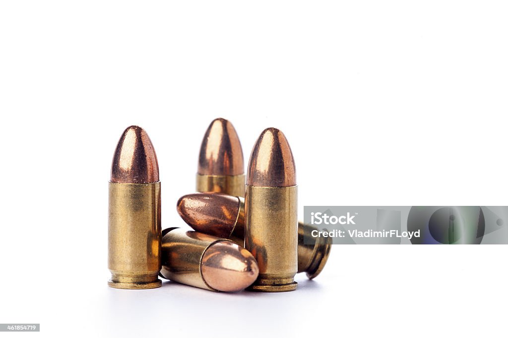 ammunition A group of 9mm bullets for a a gun isolated on a white background Ammunition Stock Photo