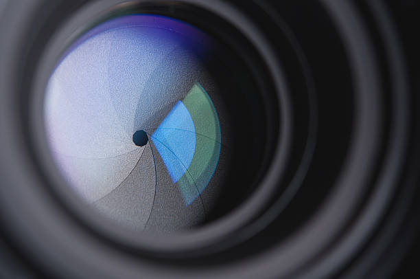 istock photo camera lens background 461855635