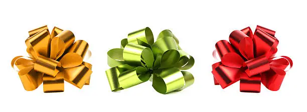 Big red green and yellow bows. Isolated on a white background.