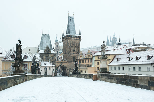 istock Snow Covered Charles Bridge in Prague 461871625