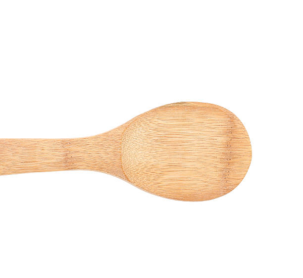 木製スプーンでさっと混ぜます。 - cooking kitchen utensil wood isolated ストックフォトと画像