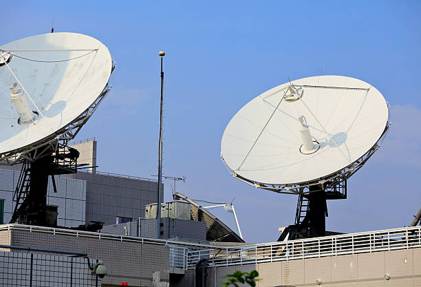 satellite dish on roof satellite dish on roof landsat satellite photos stock pictures, royalty-free photos & images