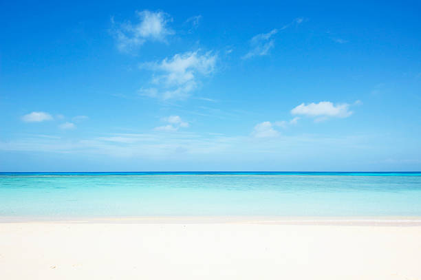 tropical seascape tropical beach in Okinawa prefecture horizon over water stock pictures, royalty-free photos & images