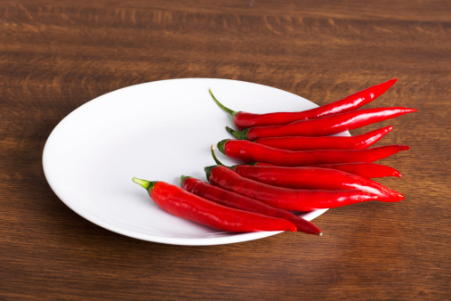 Red hot chilie pepers on plate