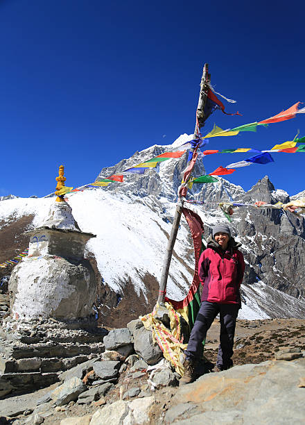 istock tabuche trekker with buddhism flag from nepal in everest himalay 461887985