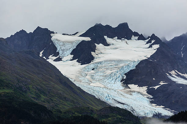 istock Glaciers high in mountains Alaska have deep blue color 461888441