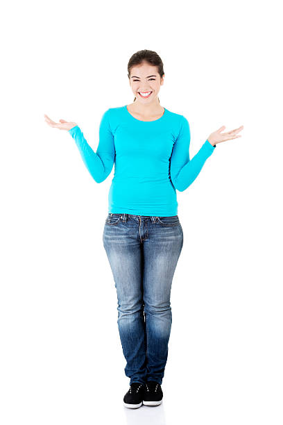 istock Happy , excited young woman presenting copy space on her palm 461892467