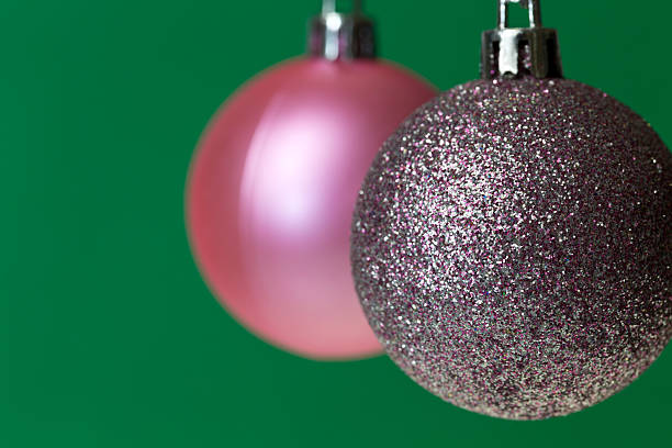 Christmas Balls Christmas balls hanging on green,with copy space to the left. rame stock pictures, royalty-free photos & images