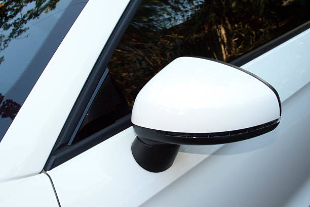 istock Abstract Closeup Side View of Rear-view Mirror And Vehicle 461894261