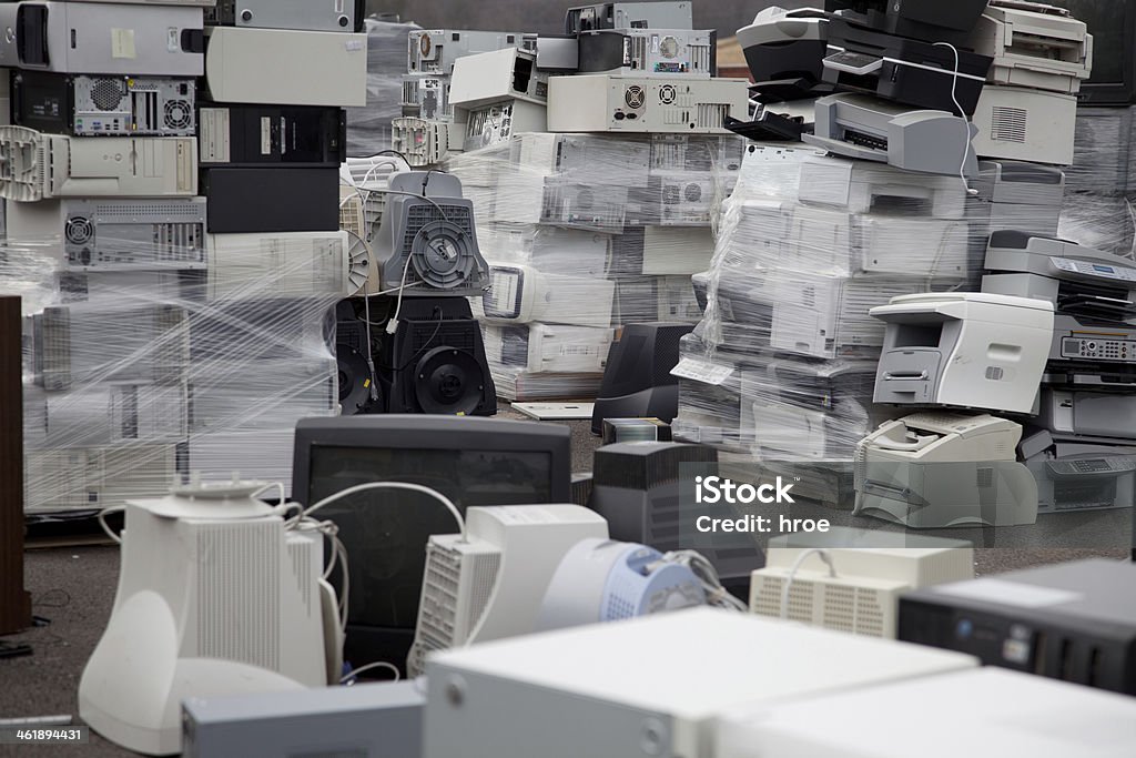 Computers printers Stacks of electronic equipment in a recycling facility. E-Waste Stock Photo