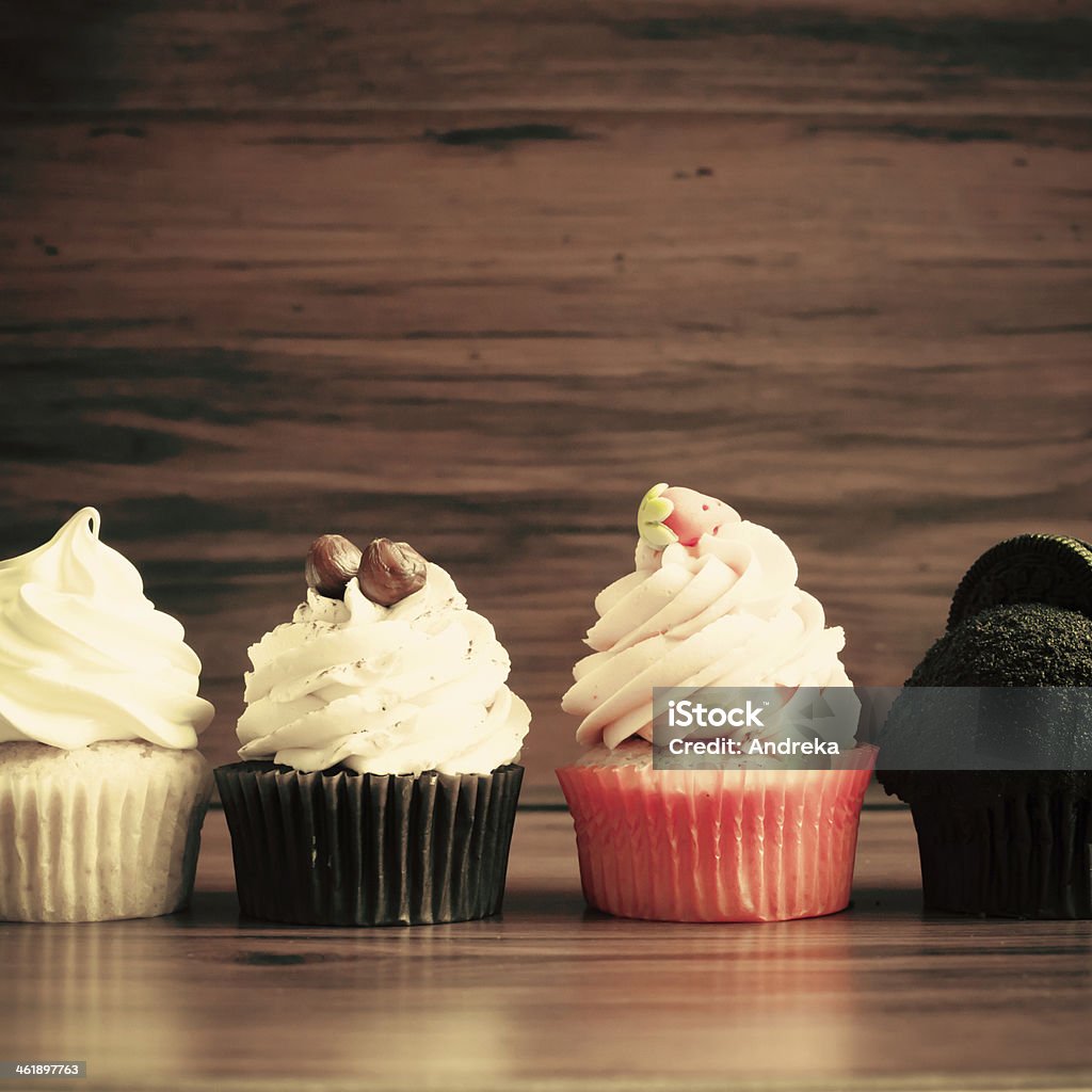 Four cupcakes Baked Stock Photo