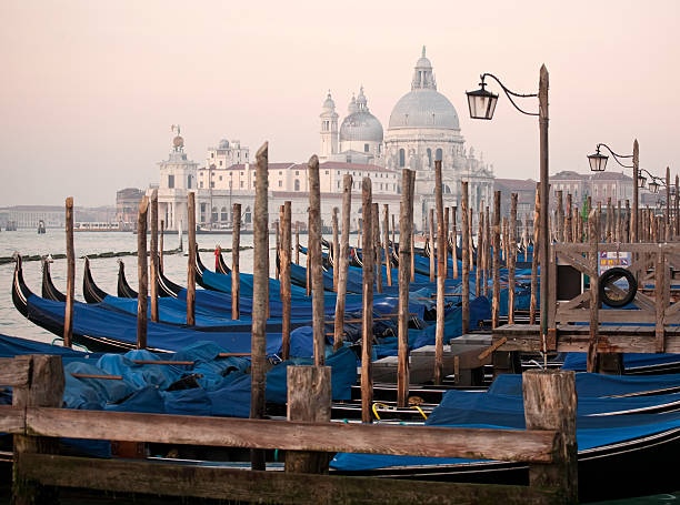 istock gondolas on Salute church background 461905819