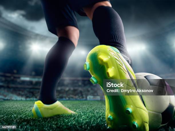 Close Up Of A Soccer Players Foot In A Stadium Stock Photo - Download Image Now - Close-up, Soccer, Soccer Shoe