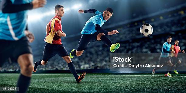 Soccer Players In Stadium Stock Photo - Download Image Now - Soccer Competition, Activity, Athlete