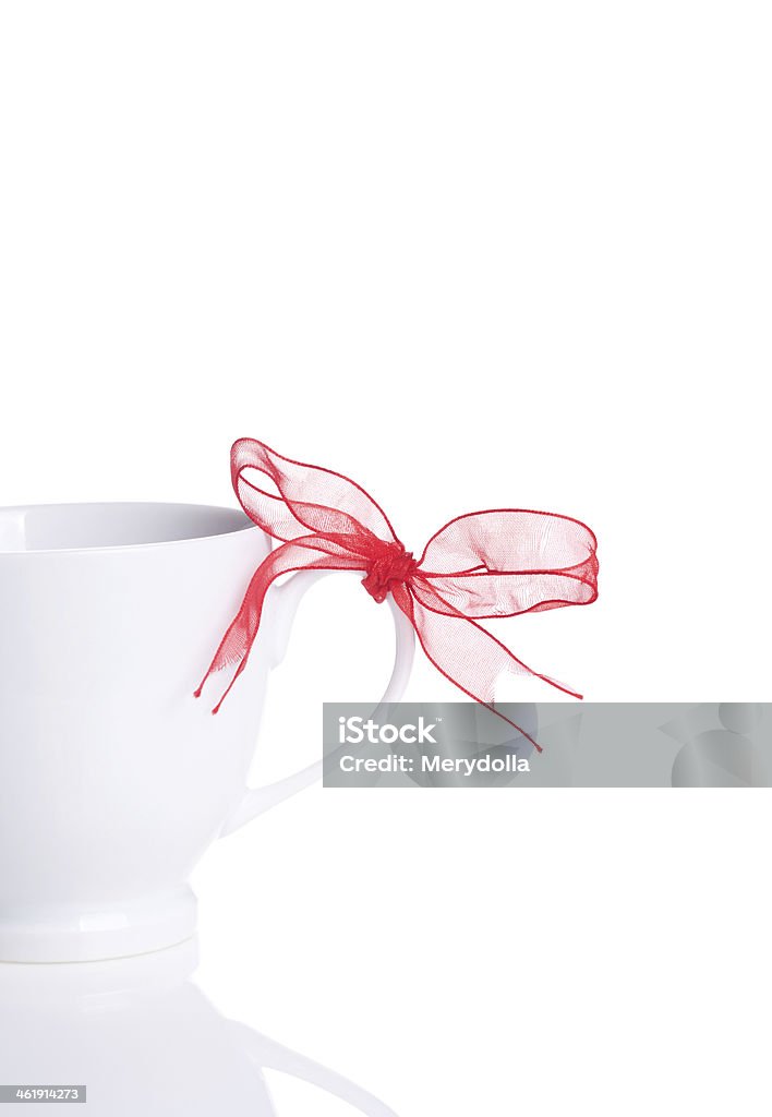 white cup with red bow on handle Cafe Stock Photo