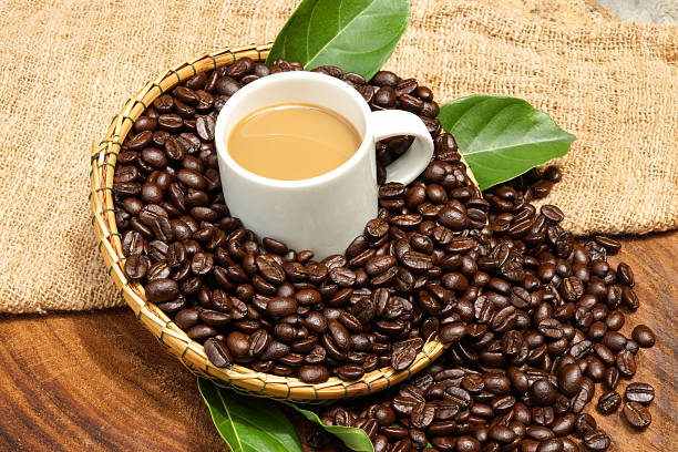 istock Coffee beans on the wooden background. 461914353