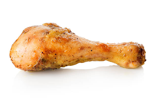 Grilled chicken leg Grilled chicken leg isolated on a white background chicken leg stock pictures, royalty-free photos & images