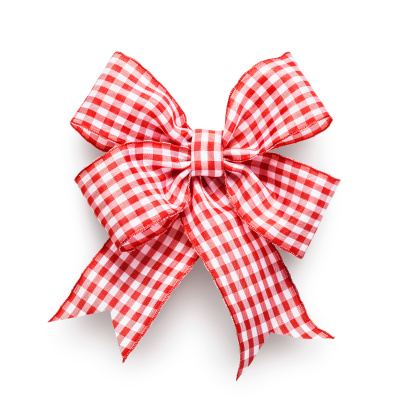 Red and white checkered ribbon bow isolated on white background clipping path included