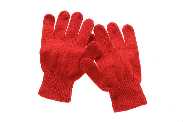 istock Red knitted cloth kid gloves with pattern  isolated on white 461925071