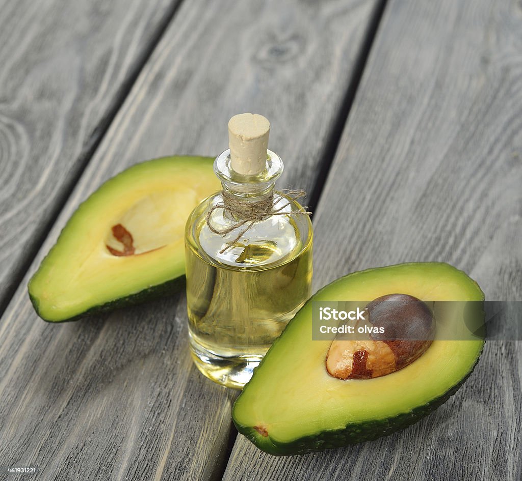 avocado oil avocado oil on a gray background Avocado Stock Photo