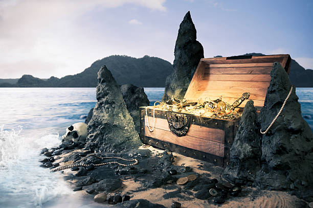 istock Open treasure chest at the beach 461931613