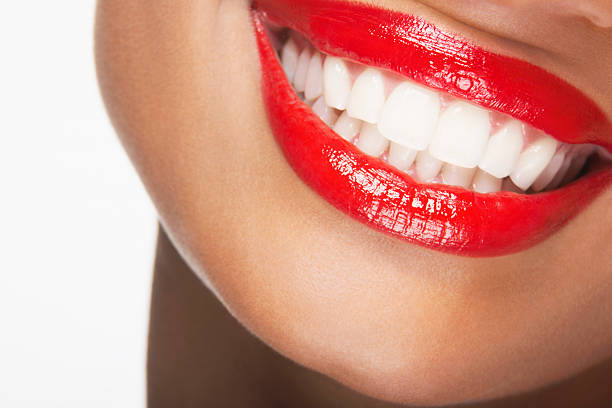 istock Beautiful Woman Smiling With Red Lips 461941389