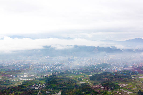 istock fog and cloud mountain valley landscape, china 461944911