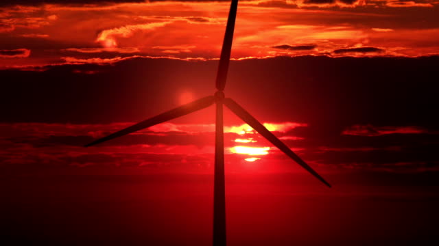 Single windmill against red sunset - HD