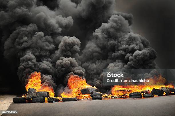 Burning Tires Causing Toxic Pollution Stock Photo - Download Image Now - Smoke - Physical Structure, Burning, Tire - Vehicle Part