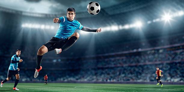 istock Soccer players in stadium 461964609