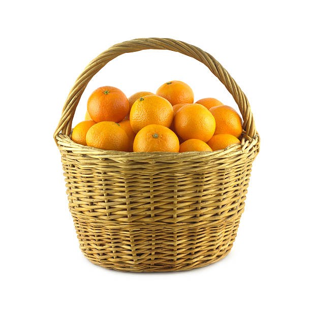 istock Tangerines in brown wicker basket isolated 461968139