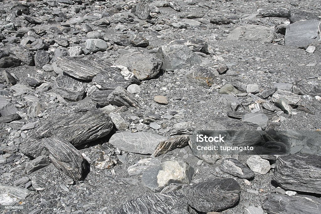 Dry river bed texture Dry river bed in Franz Josef, New Zealand. Grey stones background texture. Abstract Stock Photo
