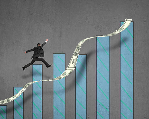 istock Businessman jumping on growing money trend with chart 461971691