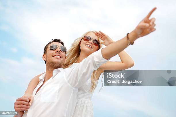 Happy Couple Over Sky Stock Photo - Download Image Now - Animal, Animal Body Part, Animal Finger