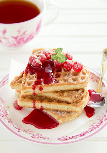 istock Homemade waffles with jam and currants. 461979083
